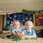 Two Lower School pupils at a Prep School classroom in Colchester Essex