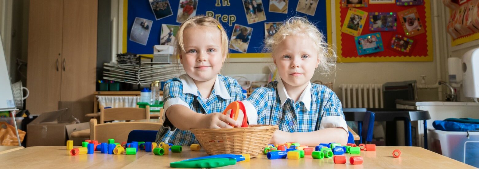 Two Lower School pupils at a Prep School classroom in Colchester Essex